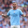 Bek Manchester City yakni Kyle Walker Puji Oliver usai Tak Beri Penalti ke Liverpool saat Pelanggaran Doku