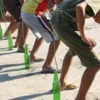 Lomba Memasukkan Pensil ke Botol